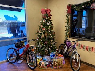 Two Bikes Under A Christmas Tree